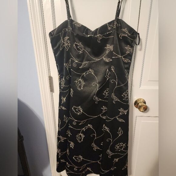 White House Black Market Dresses & Skirts - Stunning Party Dress! WHBM Black Satin with embroidered accents.Flattering flare